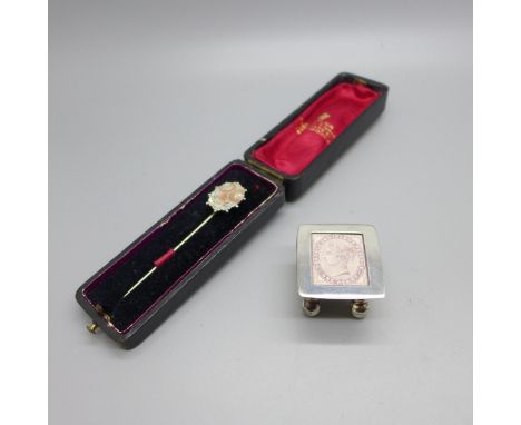 A Victorian stick pin with gold applied decoration and case and a silver stamp box, Royal Mail, hallmarked Edinburgh, with bo