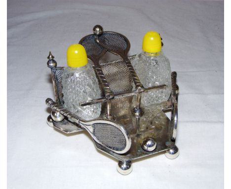 A Henry Wilkinson & Co early 20th novelty cruet set, made in the form of tennis rackets and balls, with two cut glass salt an