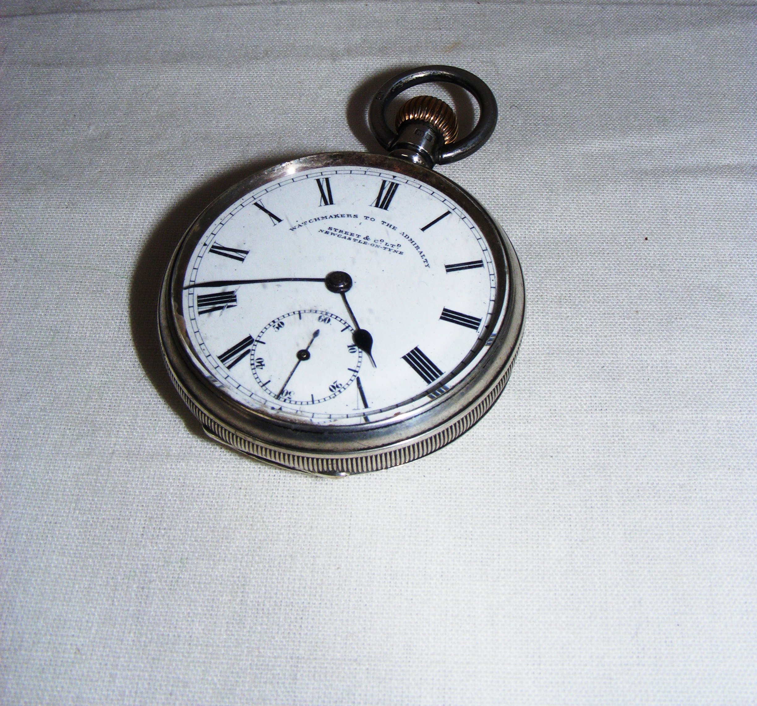 A sterling silver cased pocket watch, hallmarked for Birmingham 1910 ...