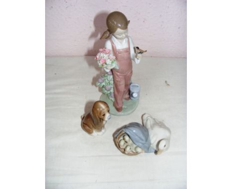 A Lladro figurine of a girl in a dress with head scarf 21.5cm tall, and three further Lladro figurines of a girl with bird, D