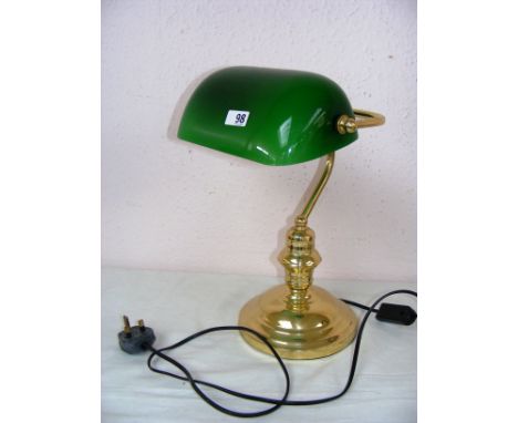 A brass and green glass shade bankers lamp. CONDITION REPORT: Good condition. 
