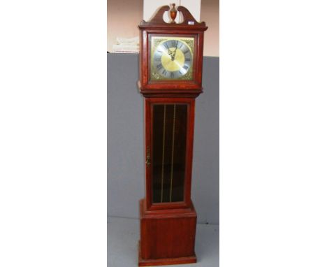 A modern Grandfather clock measuring 76" tall. CONDITION REPORT: Untested, the case is in need of attention. 
