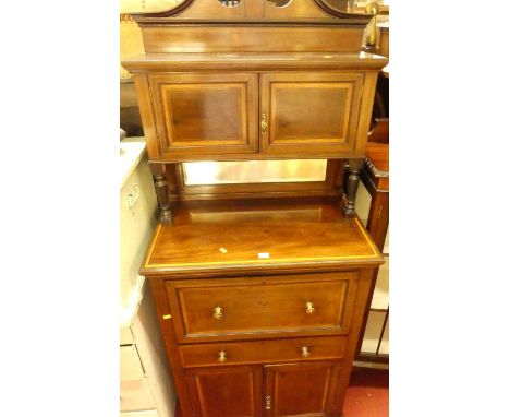A circa 1900 mahogany and satinwood inlaid compact secretaire side cabinet, having twin cupboard upper doors over a lower mir
