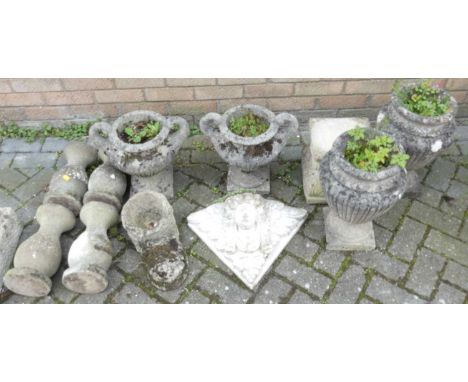 A collection of various reconstituted and concrete garden effects to include; two pairs of urn planters, a butler's sink, wal