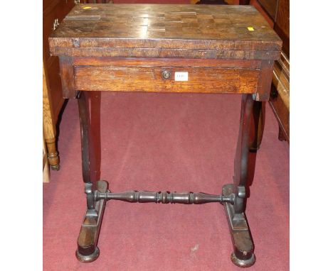An early Victorian rosewood and inlaid fold-over games table, having chessboard top over single frieze drawer, width 53cm