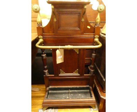 An Aesthetic Movement mahogany and brass mounted stickstand, of architectural form, w.55cmNo kitemarks
