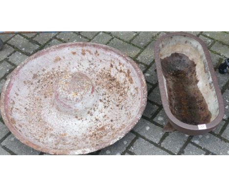A cast iron agricultural "Mexican hat" circular livestock feeding trough, dia. 68cm, together with a further feeding trough (