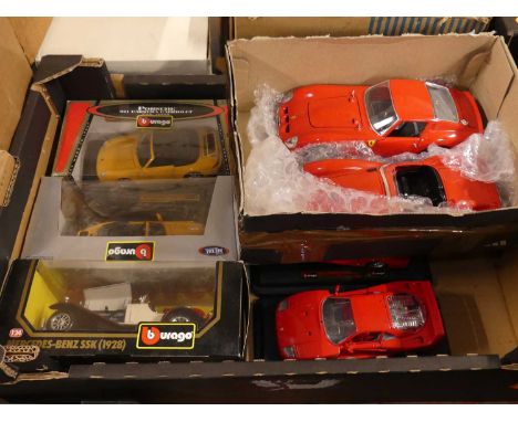 A small collection of Burago boxed and loose 1:24 scale modern issue diecast, to include a Porsche 911 Carrera Cabriolet, Mer