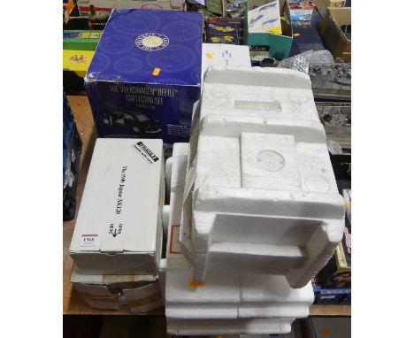 A Franklin Mint group of seven various scale boxed or polystyrene packed diecasts, to include a Volkswagen Beetle collectors 