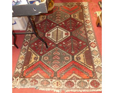 A Persian woollen red ground geometric Ardebil rug, 188 x 127cm 
