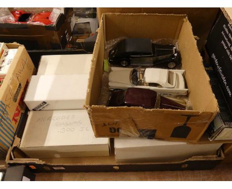 A quantity of Franklin Mint boxed and loose various scale models to include a Mercedes 300 sports car, 1955 Bentley S, 1957 C