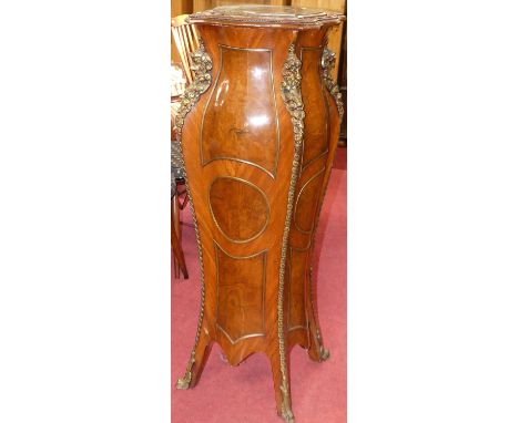 A French figured walnut, gilt metal mounted and verdigris marble topped sculpture stand, of bombé form, h.115cmHas a slight w