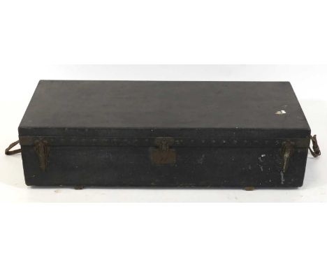 Louis Vuitton - a circa 1900 canvas and brass mounted steamer trunk, the latched hinged cover enclosing plain lined interior,