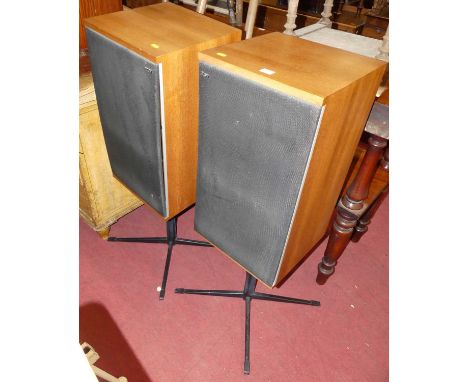 A pair of Bowers &amp; Wilkins model DM2 teak freestanding speakers, each on black enamelled metal four spoke bases, each hei