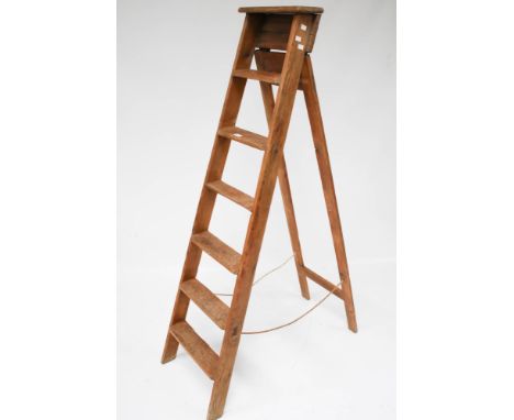 A vintage wooden step ladder. With six rungs. H178cm