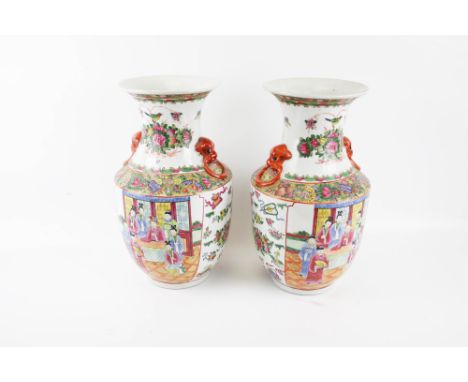 Pair of Chinese republic porcelain vases. With polychrome enamel decoration of figures and flowers. H37cm