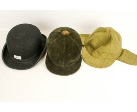 Three vintage hats. Including a traditional cork riding helmet, a deerstalker, size XL, and a Herbert Johnson bowler.