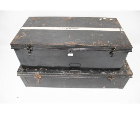 Two large vintage black painted tin storage trunks. Max. L104cm x D44cm x H26cm
