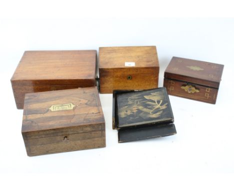An assortment of 19th century and later wooden boxes. Including a mahogany sewing box with a fitted interior and containing a