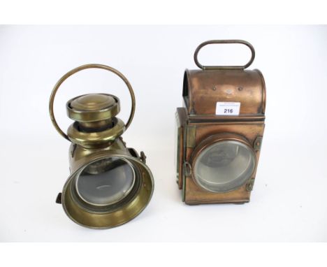 Two vintage car lanterns. Including a S. Smith &amp; Sons (Motor Accessories) Ltd brass example, H27cm, and an unmarked coppe