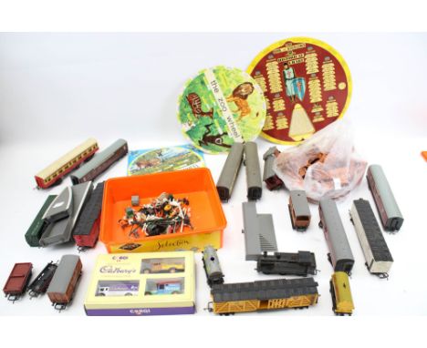 A vintage collection of assorted OO gauge model railway items. Including a tank engine, rolling stock and trackside accessori
