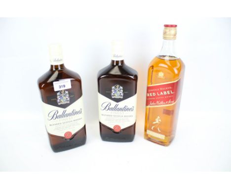 Three 1ltr bottles of Scotch whisky. Including two Ballantine's and a Johnnie Walker Red label.