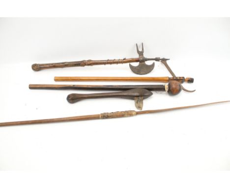 A collection of assorted hand weapons. Including a throwing spear, a flint axe and a coromandel wood club, etc.