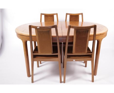 Vintage Retro : A Nathan Furniture teak extending dining table and four chairs. A D-ended table (labelled) and labelled dinin