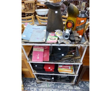 A VINTAGE STEEL FOUR TIER WORK TABLE, MOTORCAR RELATED TOOLS, AA BADGES, OIL CANS ETC. 