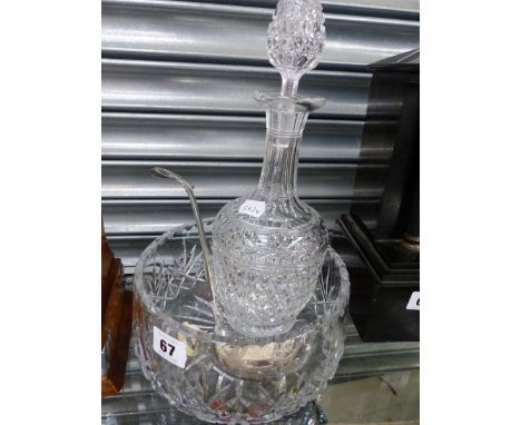 A CUT GLASS DECANTER, A CUT GLASS BOWL, AND A SILVER PLATED LADLE. 