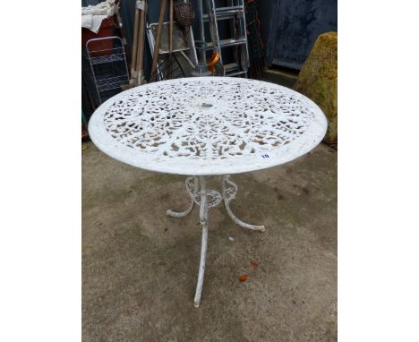 A VINTAGE CAST IRON GARDEN TABLE.