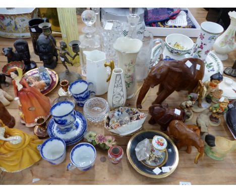 A QUANTITY OF VARIOUS DECORATIVE CHINA WARES, HUMMEL FIGURINES, THREE DECANTERS, VASES ETC. 