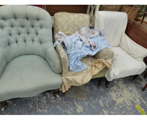 A LATE VICTORIAN BUTTON BACK ARMCHAIR AND TWO LATER ARMCHAIRS. 