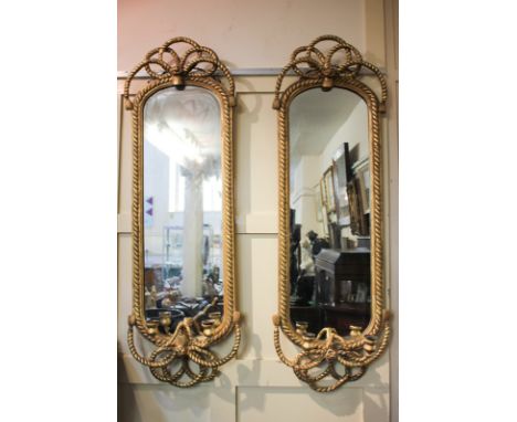 A pair of giltwood and gesso girondelle wall mirrors, each with rope-twist surmount and two-branch light holders, mirror plat