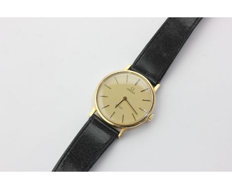 A gentleman's 18ct yellow gold Omega de Ville slim cased wristwatch with manual wind movement