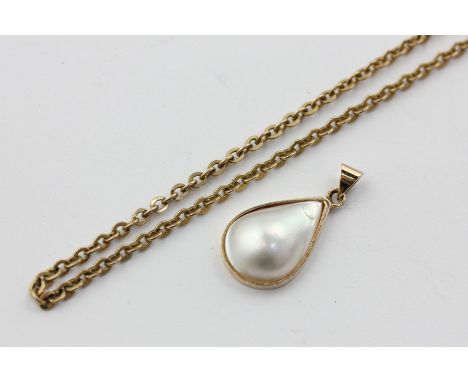 A 9ct gold oval link chain, and a gold mounted mabe pearl pendant