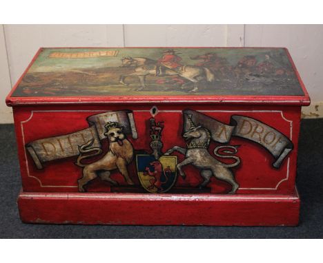 A painted wooden trunk with two rope handles, decorated with a battle scene and coat or arms to commemorate the Battle of Det
