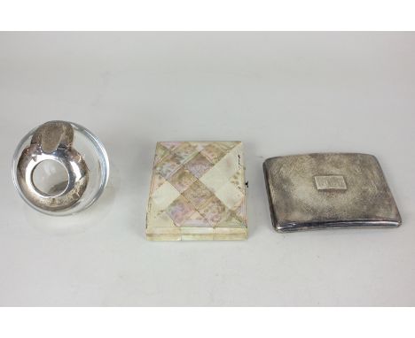A George V silver cigarette case with initialled plaque and inscription to interior, and a silver mounted glass globe shaped 