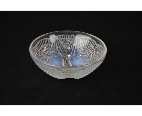 A Rene Lalique Coquilles opalescent bowl, circular moulded with four conjoined shells, etched R Lalique France mark to base, 