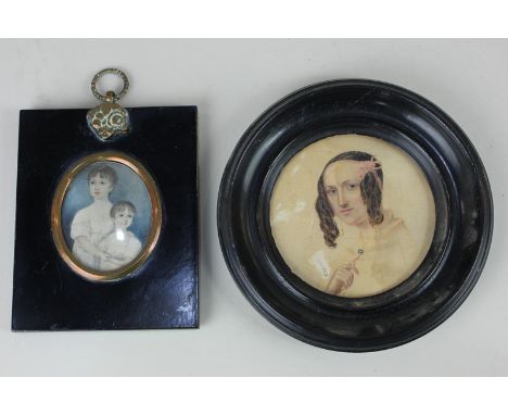 A 19th century oval miniature portrait of two young children, 5.5cm by 4cm, together with a circular miniature portrait of a 