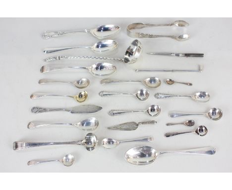 A Victorian silver tot ladle, maker Chawner & Co, London 1864, together with eighteen various silver spoons, a trowel page ma