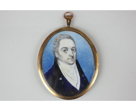 A 19th century oval portrait miniature of a gentleman wearing a blue coat and white cravat, 6.5cm by 5cm, in glazed gilt fram