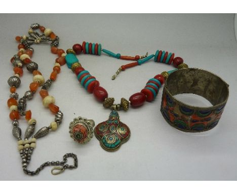 Two necklaces, a bangle and a ring