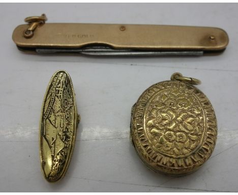 A rolled gold penknife, locket and tie pin