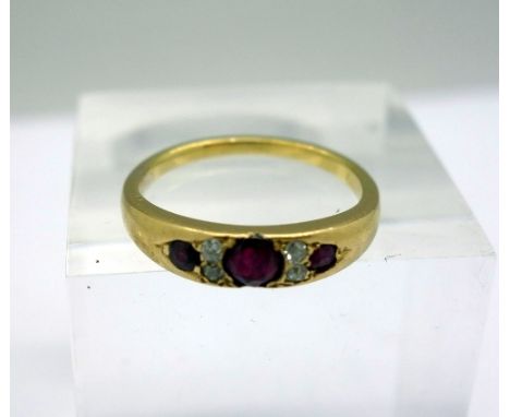 A yellow metal, ruby and diamond ring, weight 3.2g, size L