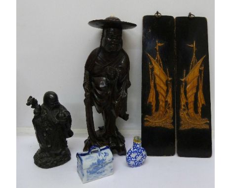 Two carved oriental figures, two plaques, flask and pot