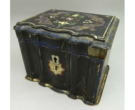 A 19th Century papier mache tea caddy by Jennens & Bettridge, makers to The Queen marked on base, a/f