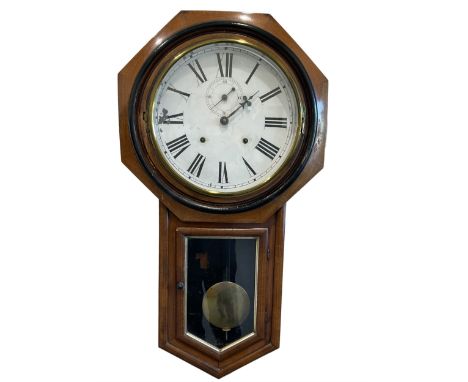 American Ansonia twin train spring driven wall clock with an eight-day movement striking the hours on a gong, with an eightee