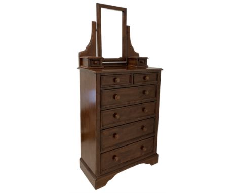 Willis &amp; Gambier - mirror backed chest, the adjustable mirror over two trinket drawers and two short and four long gradua