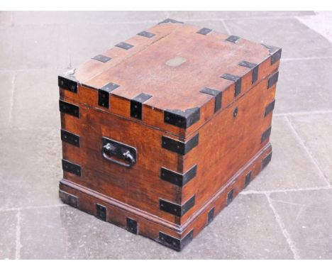 A 19th Century metal bound oak trunk with fitted interior. W68cm D50cm H51cm